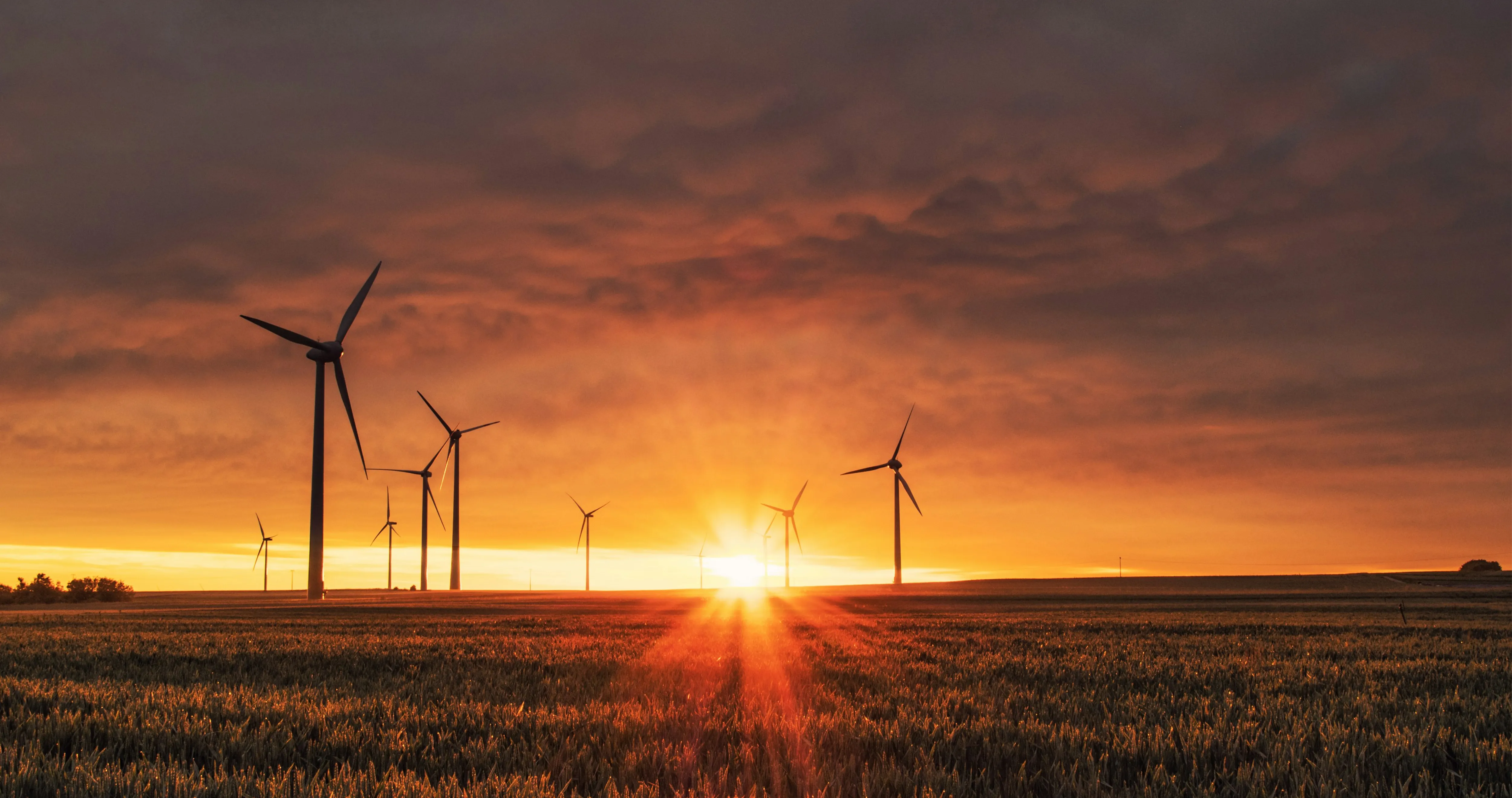 Wind turbines at sunset